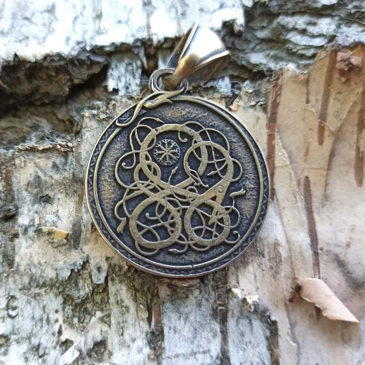 Aegishjalmur bronze pendant with serpent