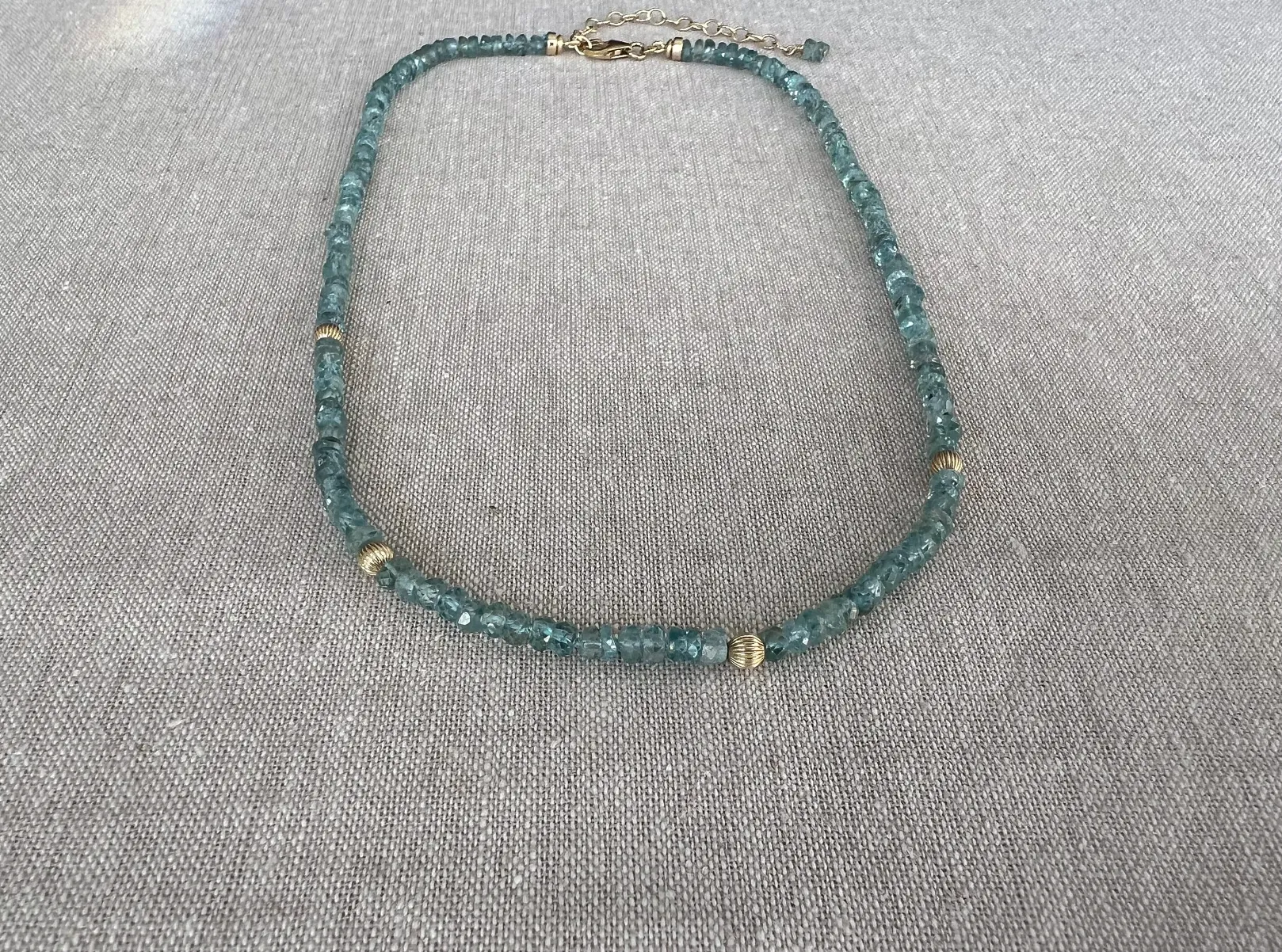 Blue Zircon Necklace with Gold Accents