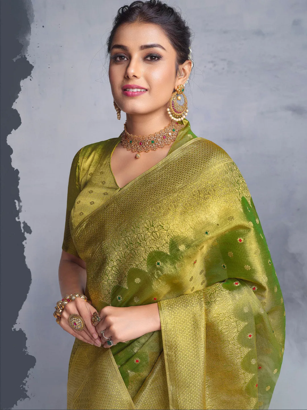 Dashing Parrot Green Saree with Heavy Golden Borders