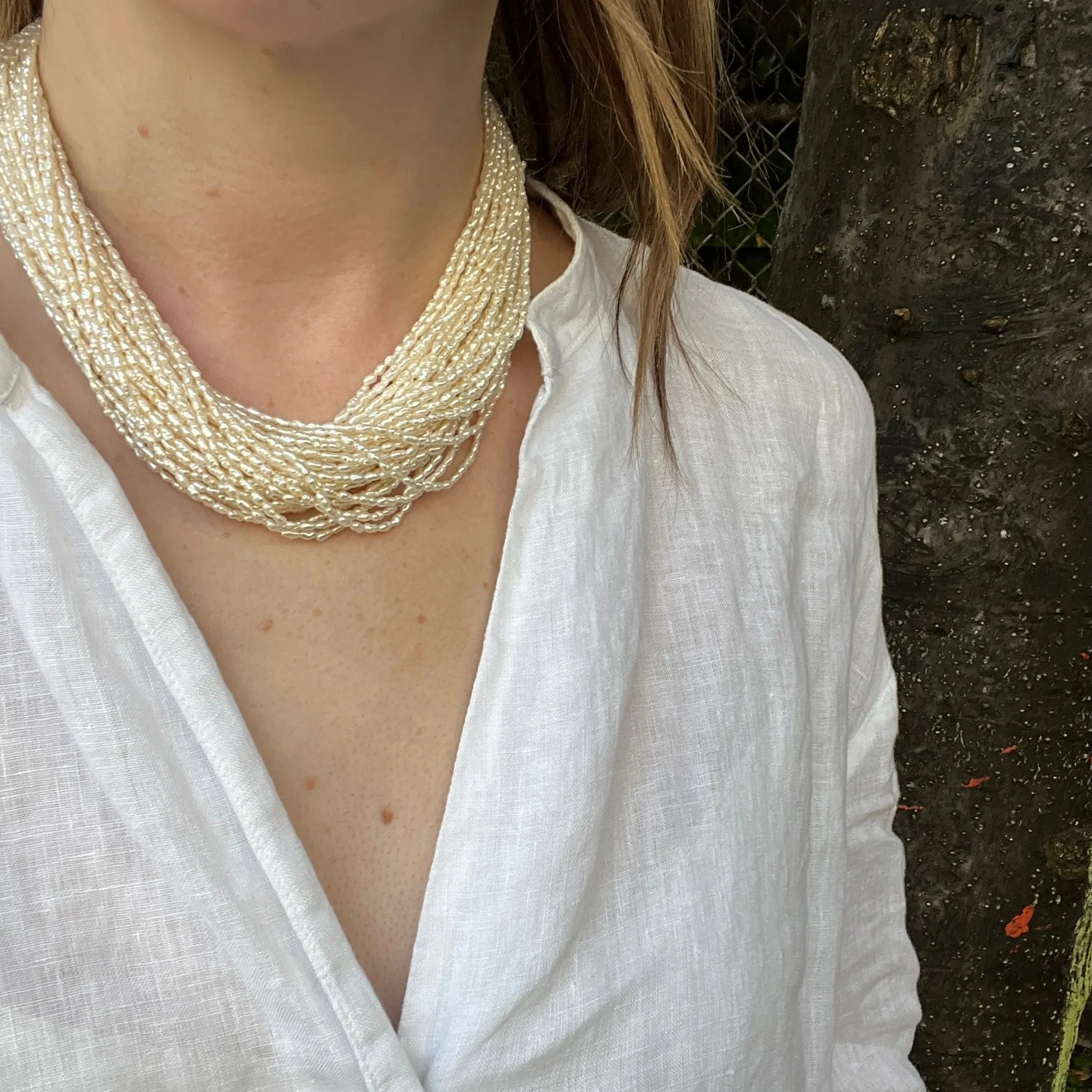 Effervescent Multi Strand Pearl Necklace with Gold & Diamond Clasp