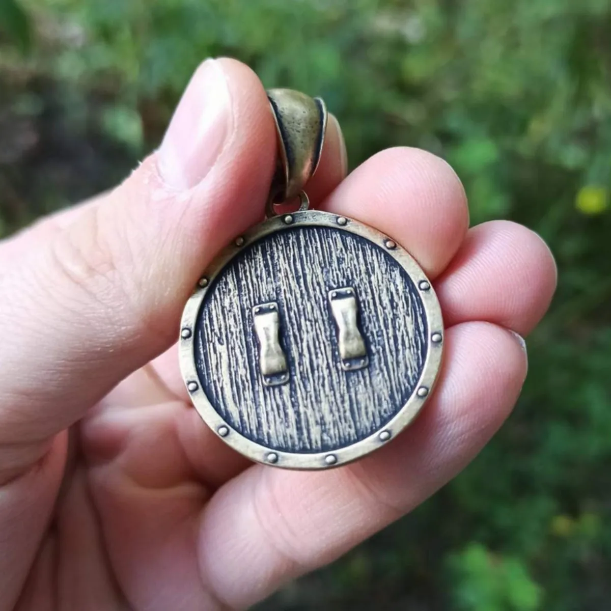 Helm of Awe on Viking shield bronze pendant