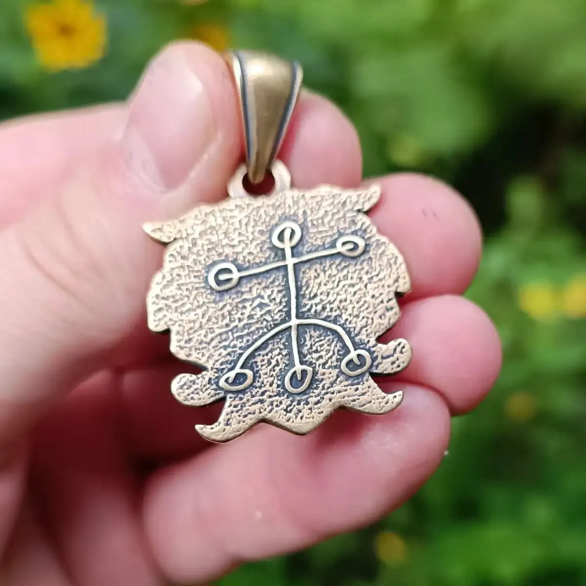 Loki mask bronze pendant