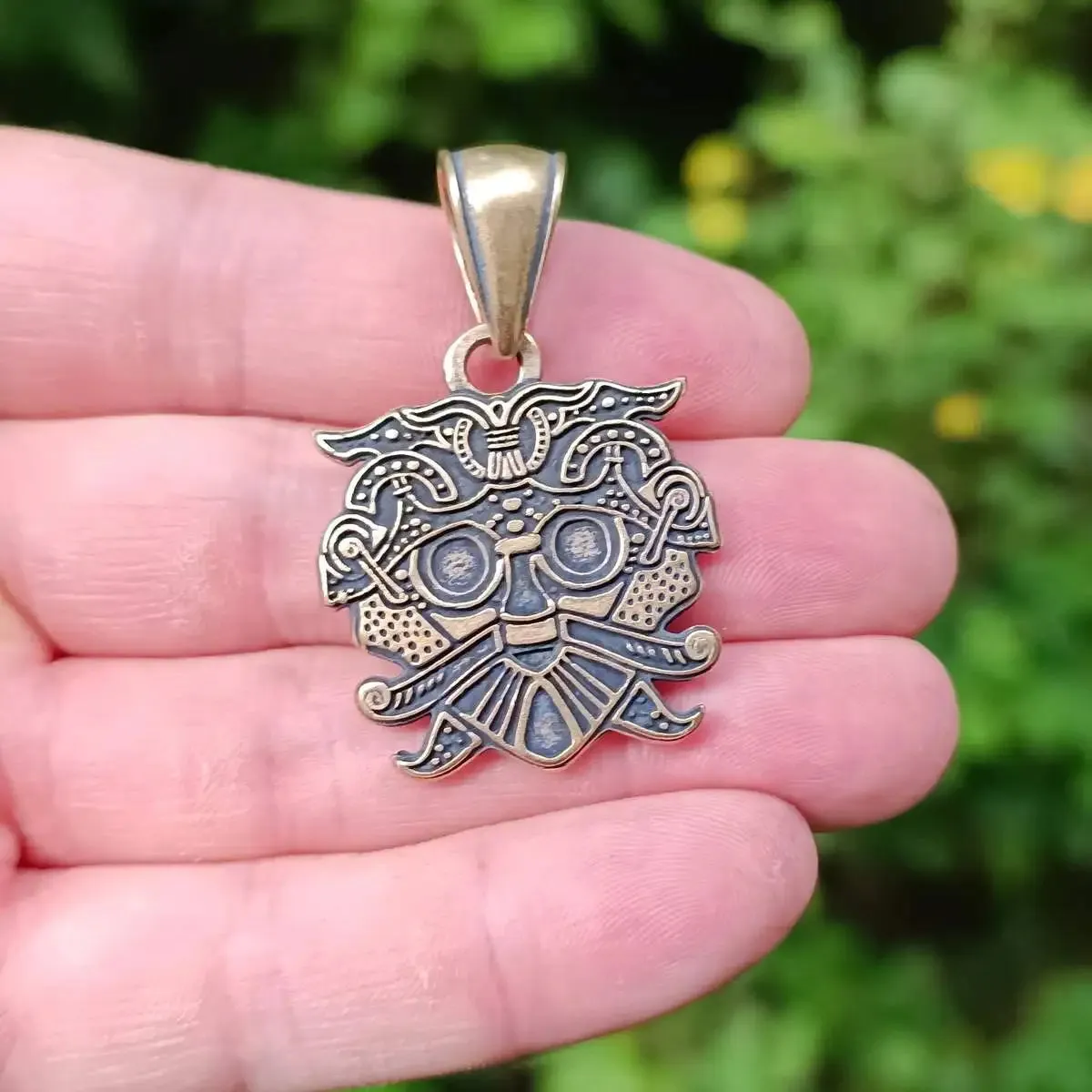 Loki mask bronze pendant