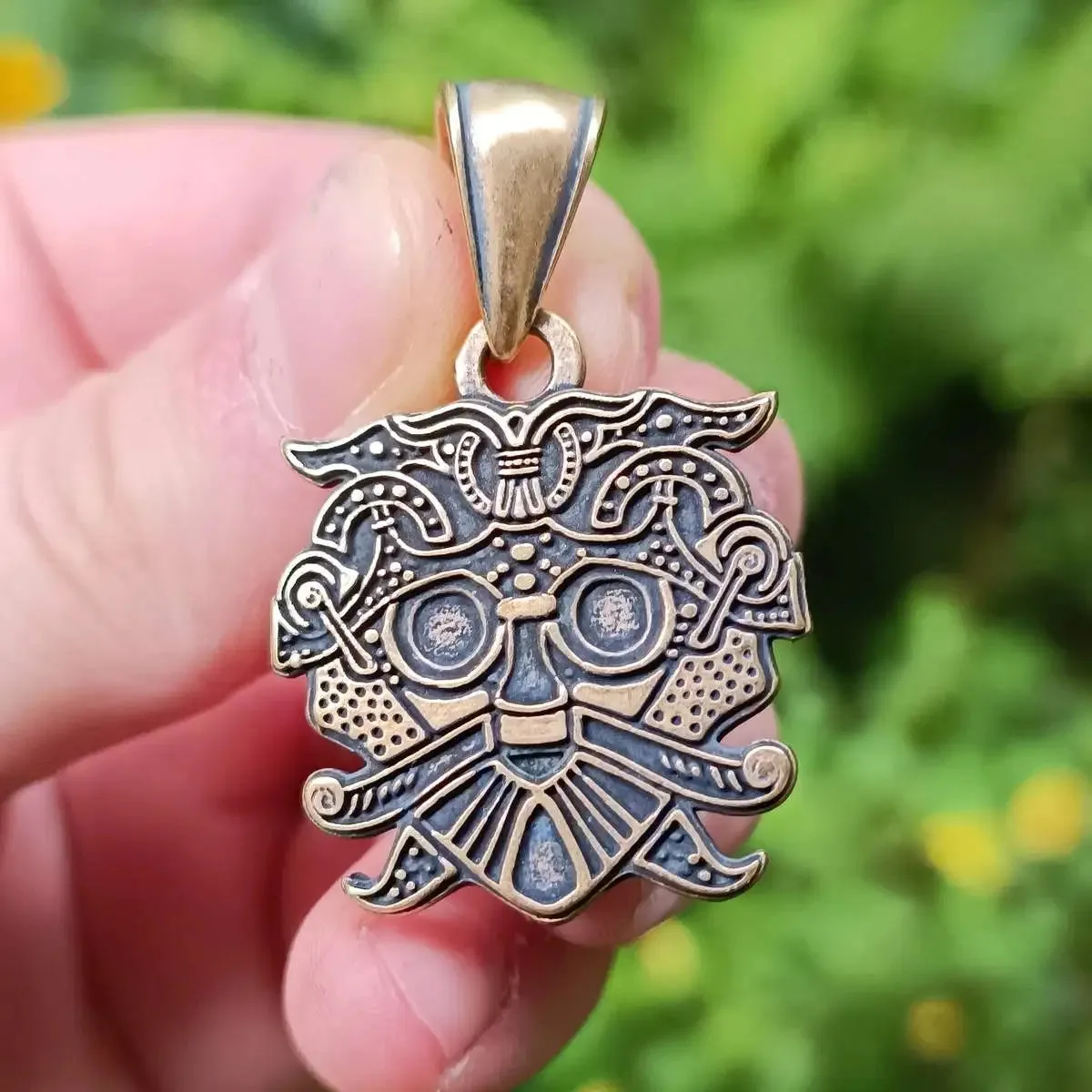 Loki mask bronze pendant