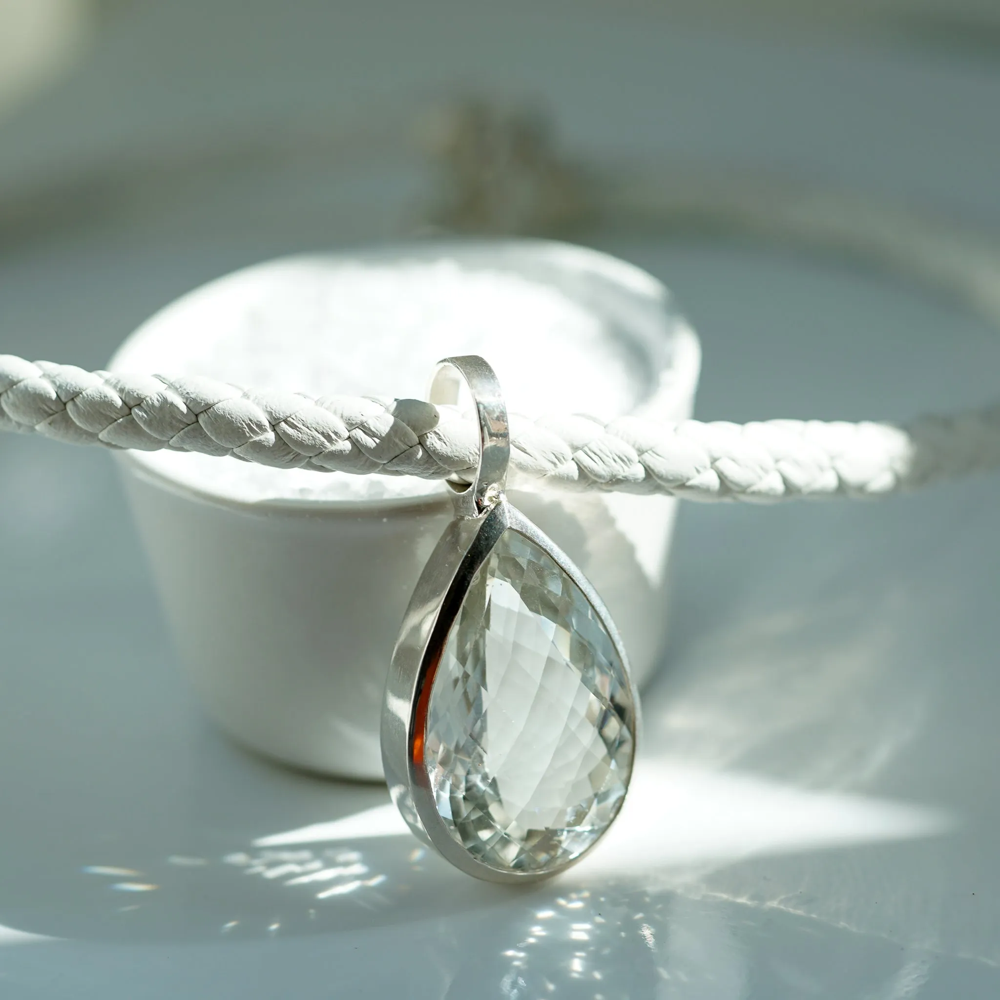 Pear Shaped white Quartz necklace with white braided leather