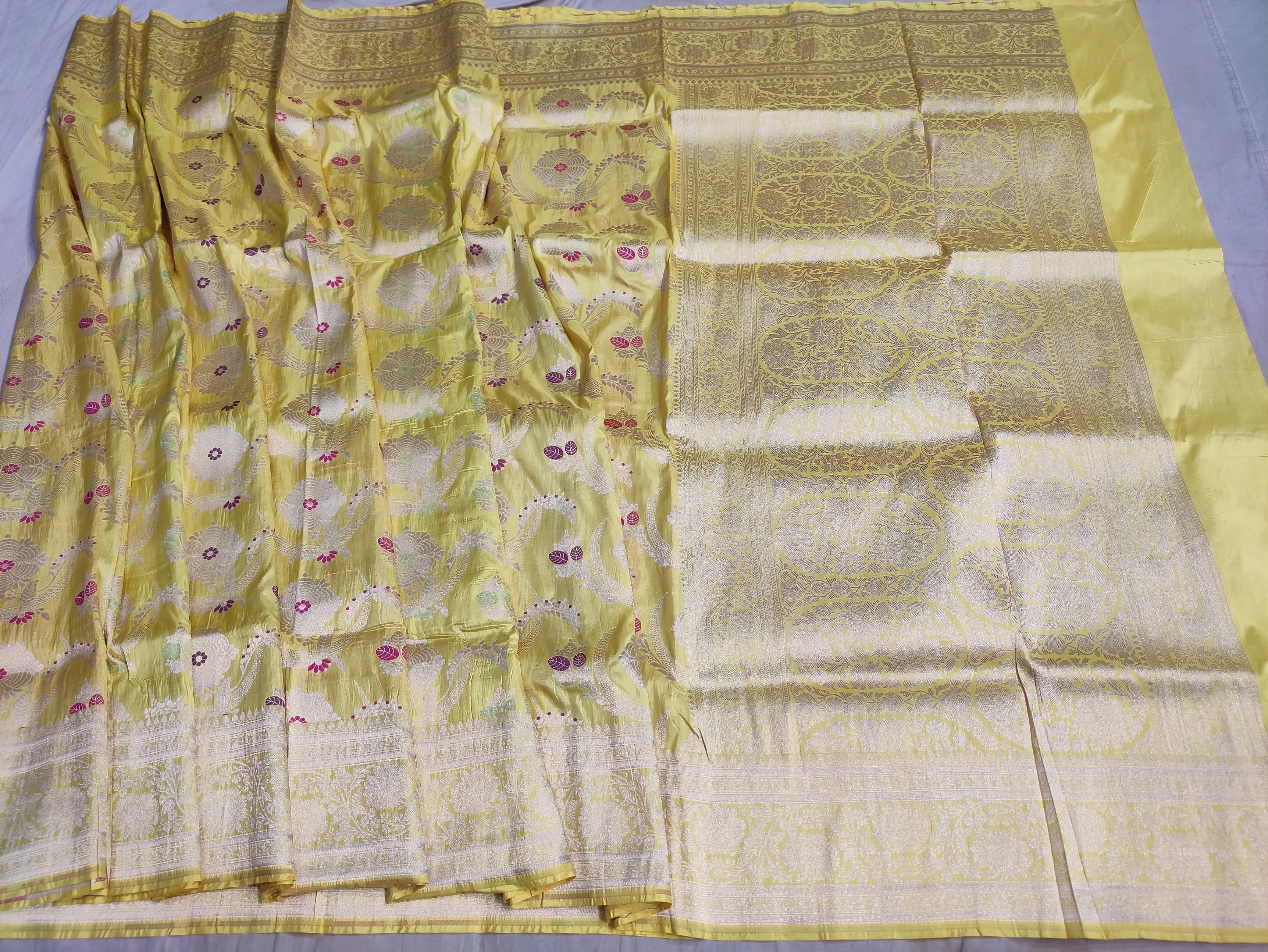 Pure banarasi with jungle boota meenakari golden Zari work saree