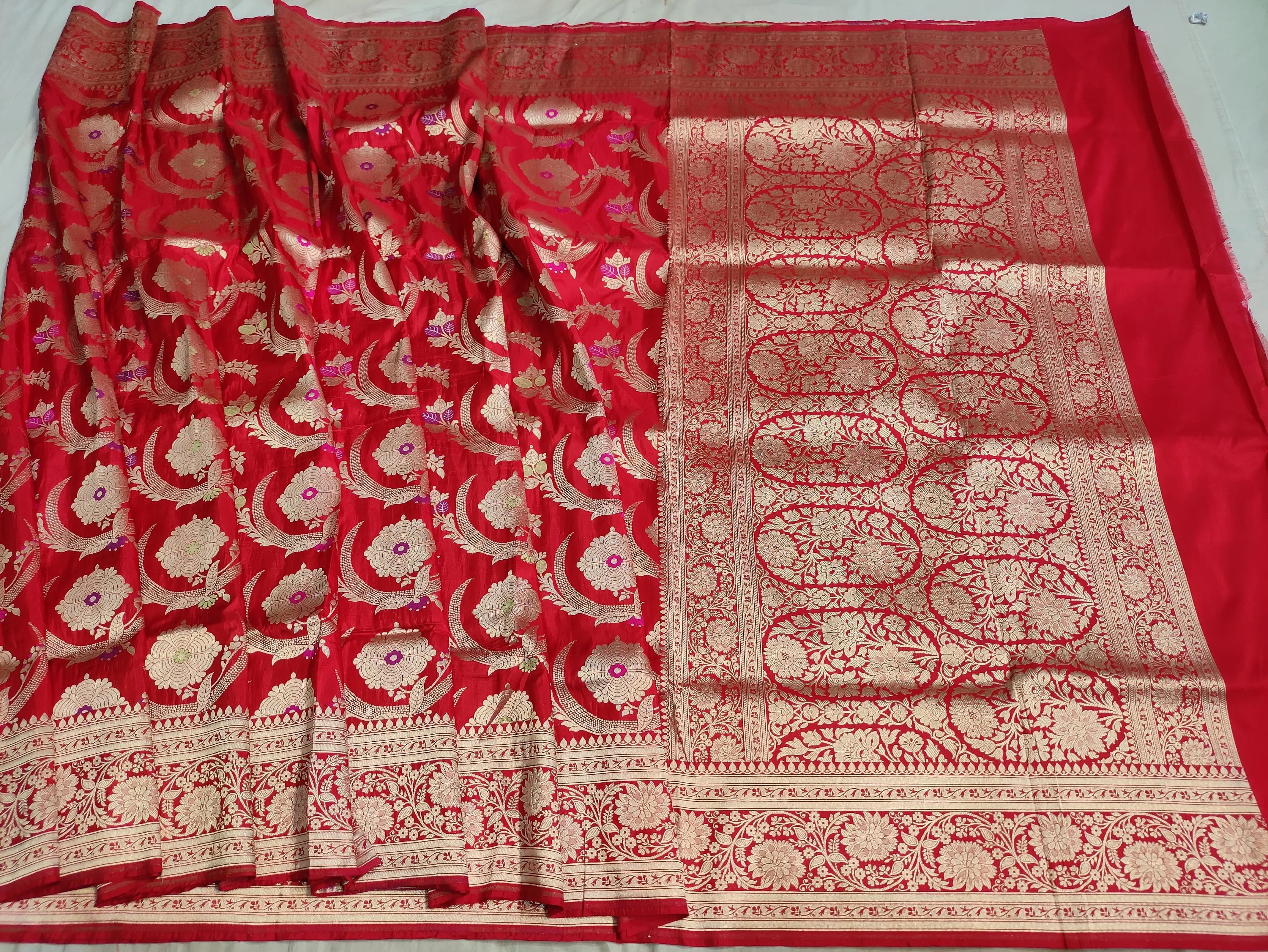 Pure banarasi with jungle boota meenakari golden Zari work saree