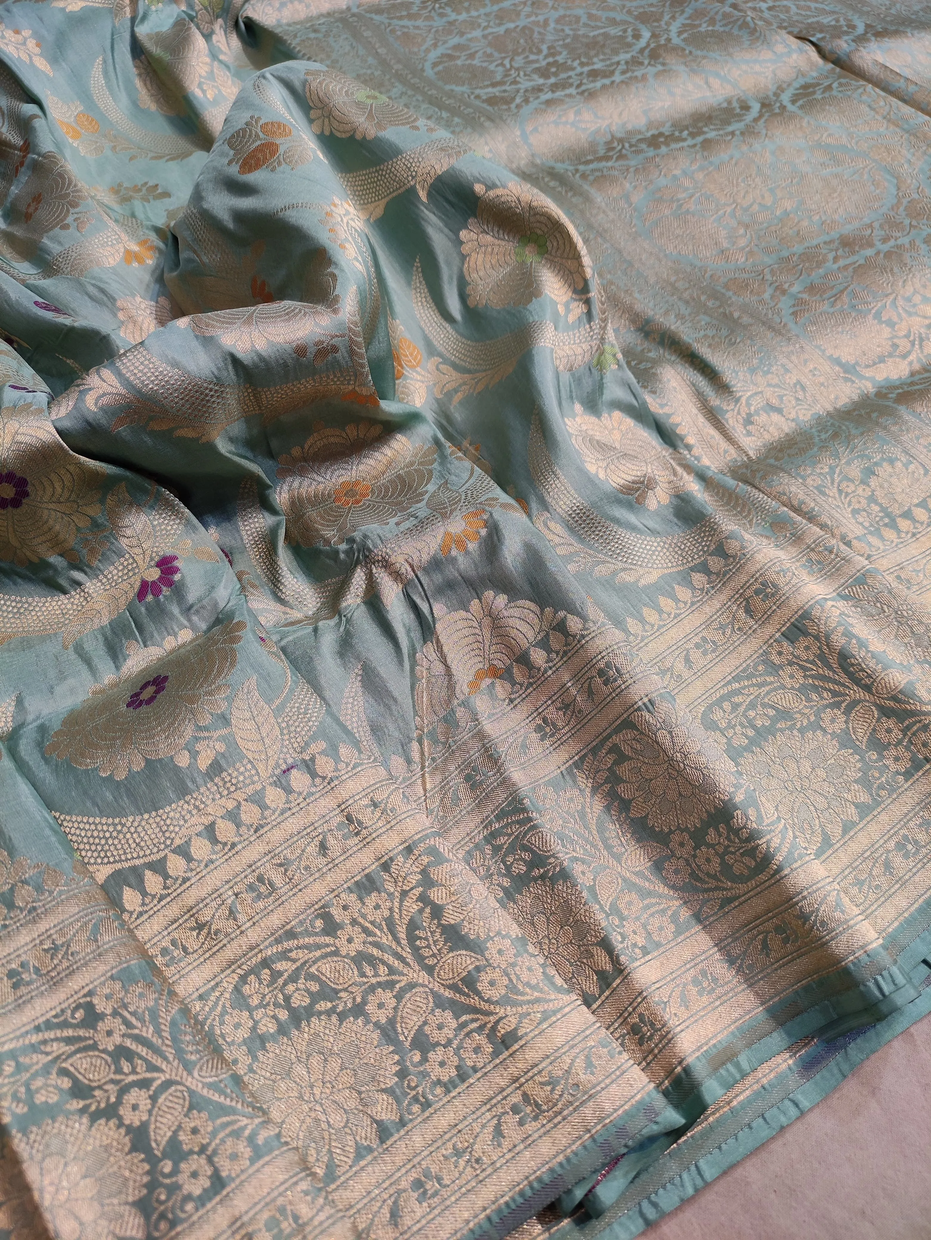 Pure banarasi with jungle boota meenakari golden Zari work saree
