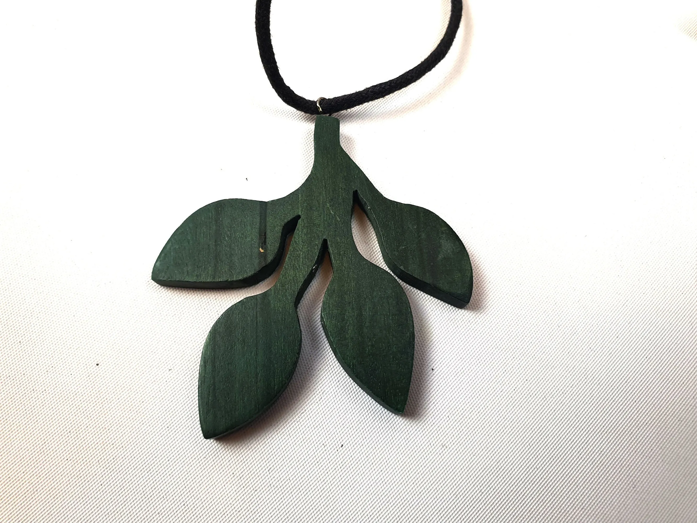 Rare Rabbit non-leather black necklace with green wooden leaf