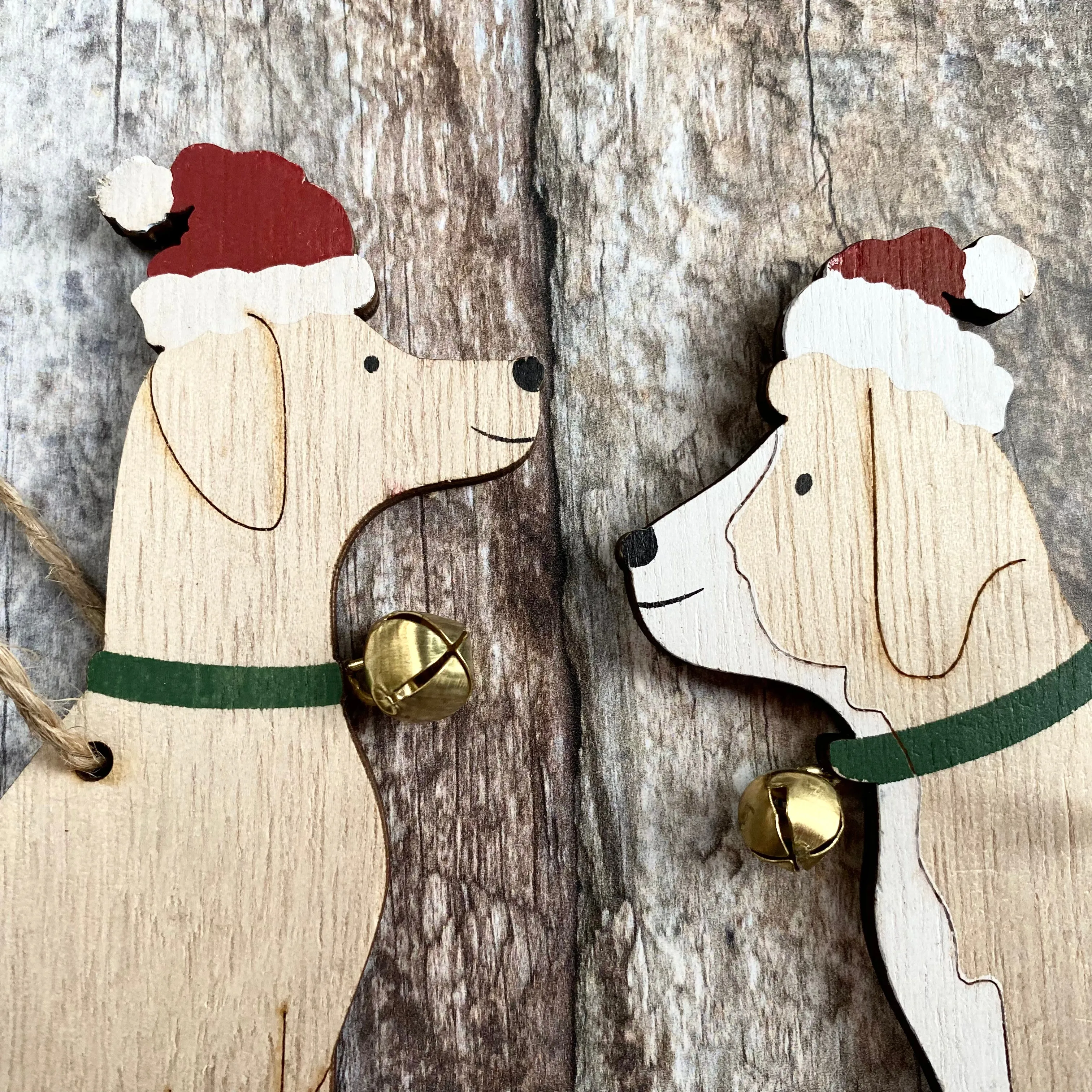 Two hanging Dogs with Bells