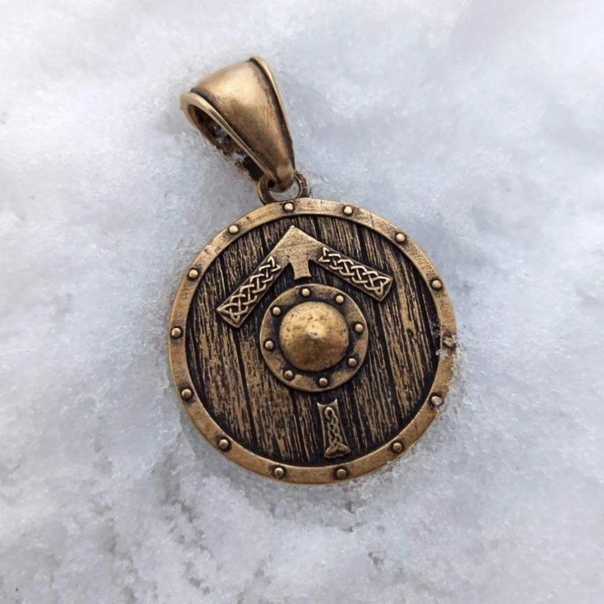 Tyr rune on Viking shield bronze pendant