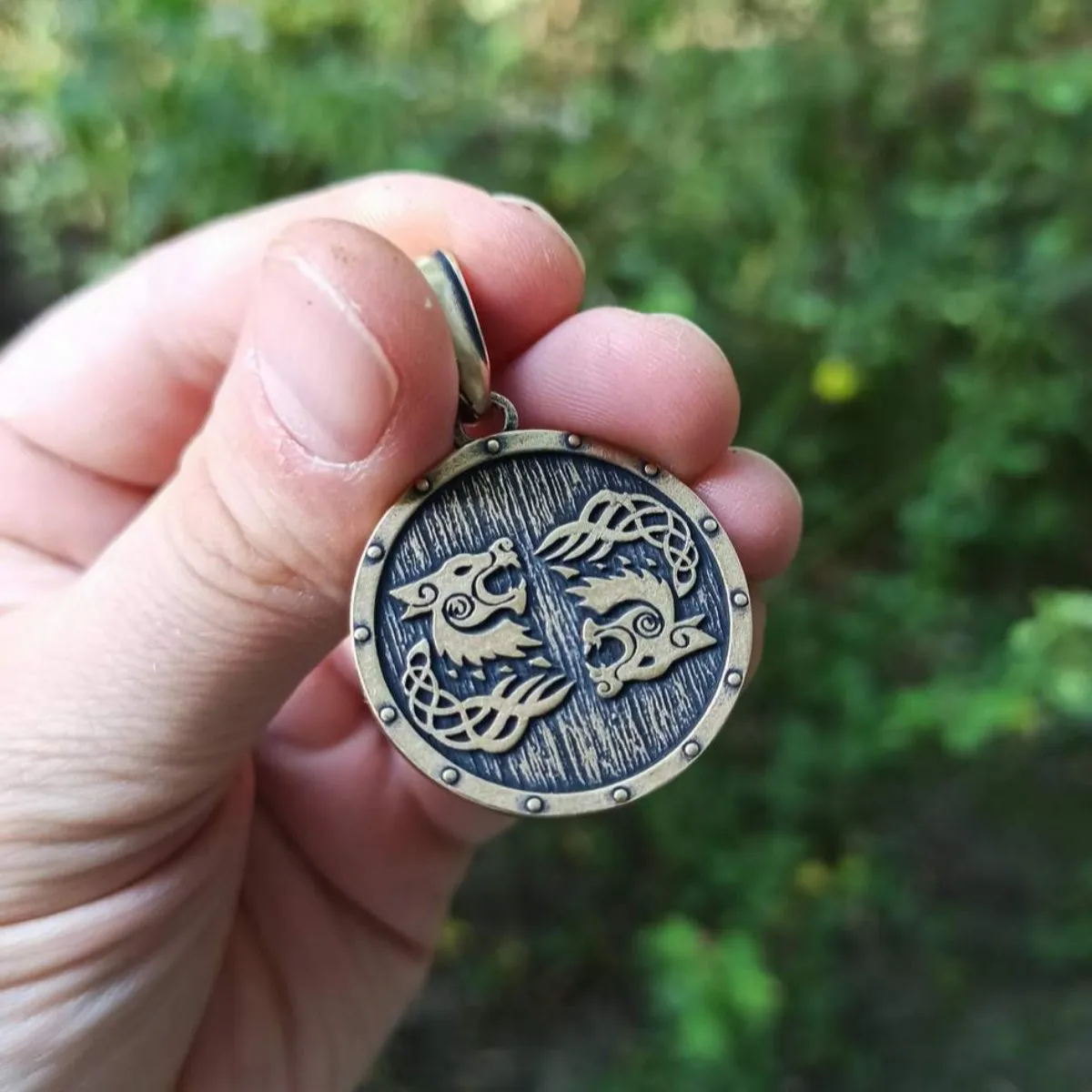 Tyr rune on Viking shield bronze pendant