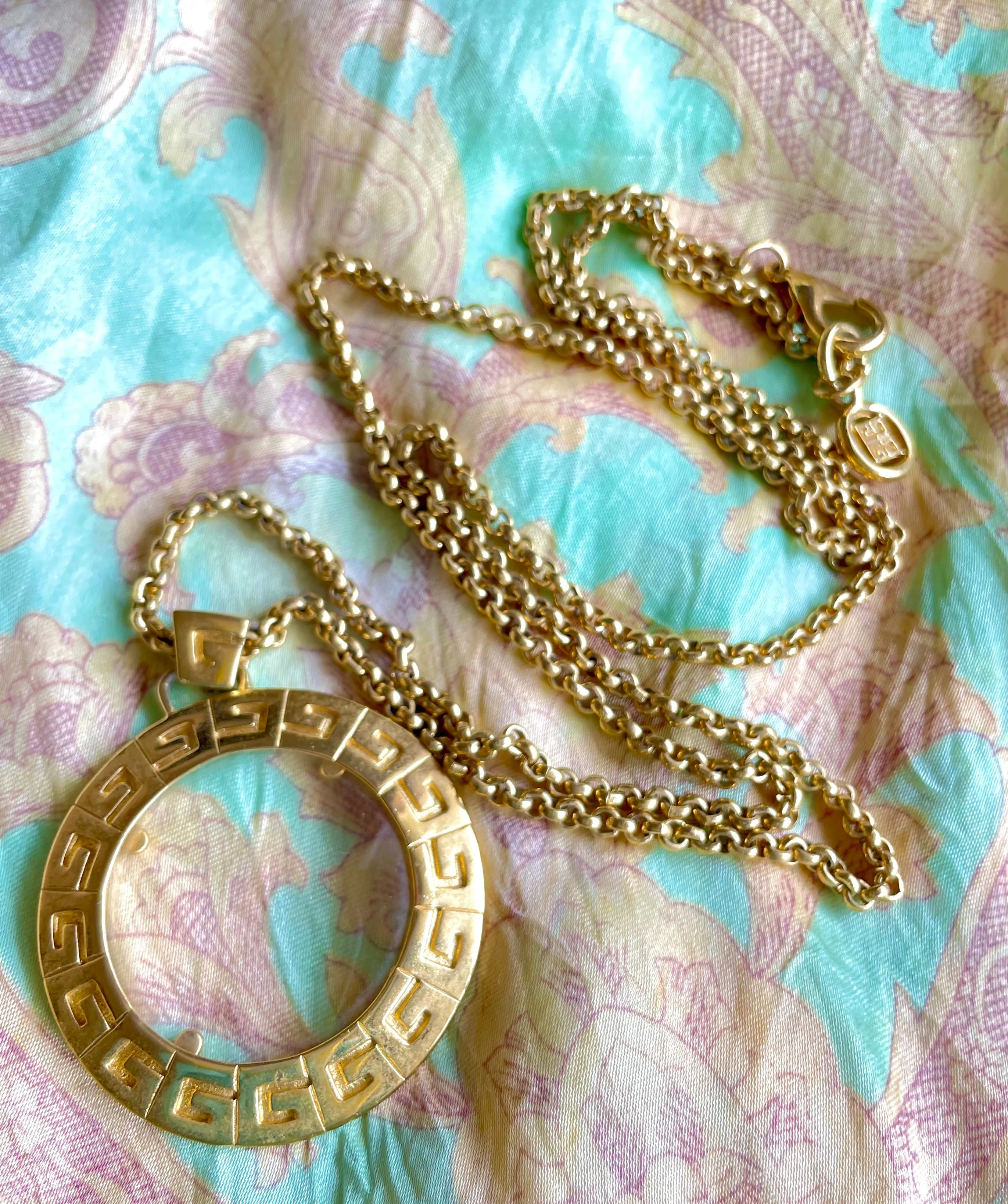 Vintage Givenchy golden chain necklace with round loupe top. Must have statement necklace. 0409274